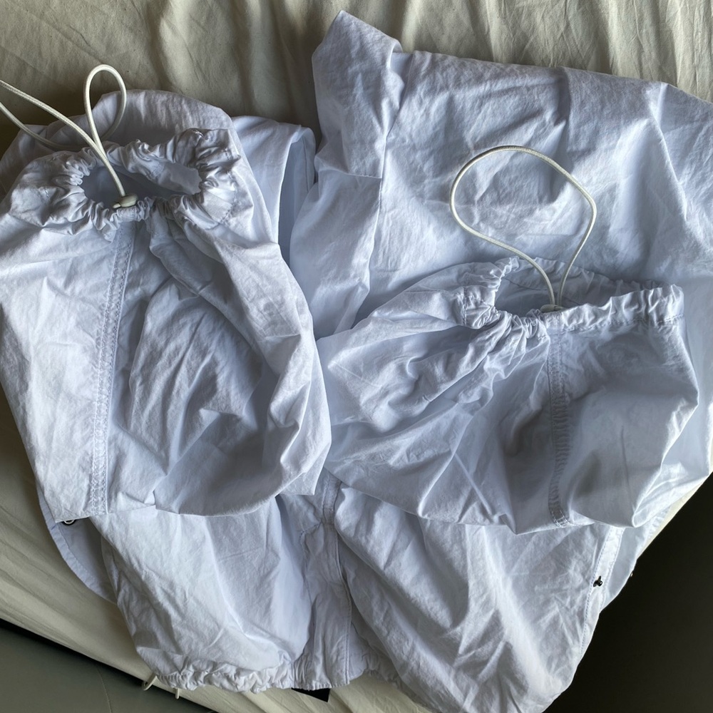 from urban outfitters, parachute pants in color white size M